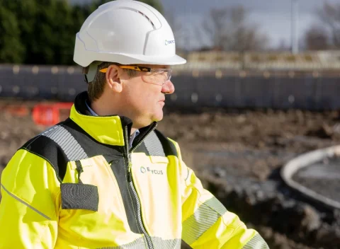 Person looking to the side in an Encyclis hard hat